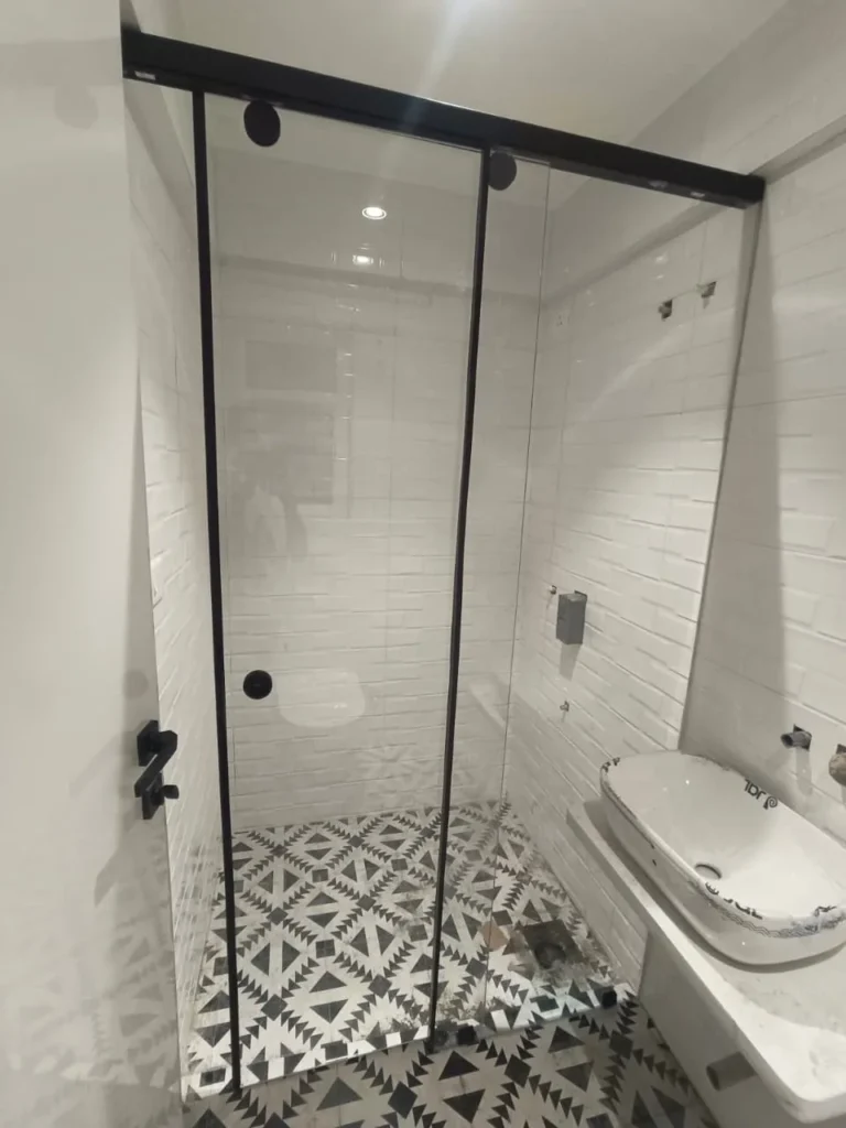 Frameless glass shower cubicle for modern bathroom