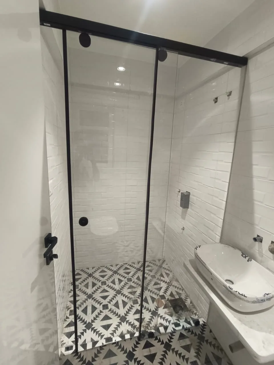 Frameless glass shower cubicle for modern bathroom
